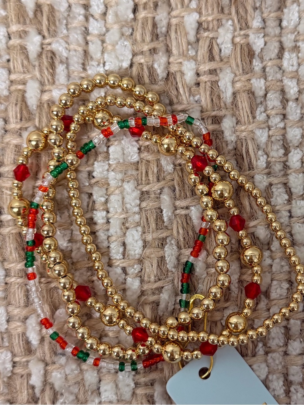 Gold Beaded Bracelet Set with Red and Green Accents